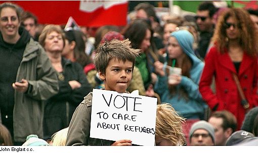 Picture says: Vote to care bout refugees